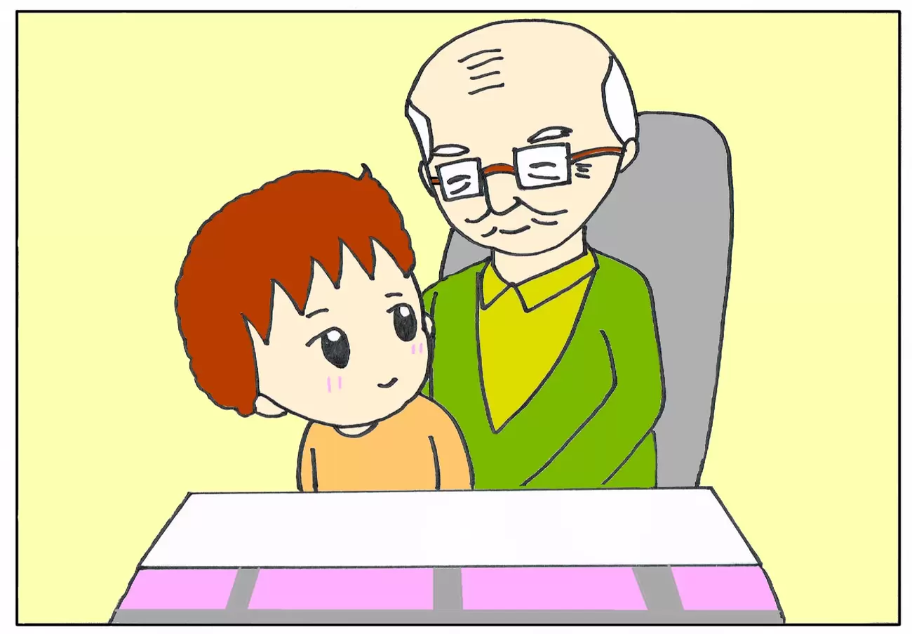 膝に座る自閉症の息子