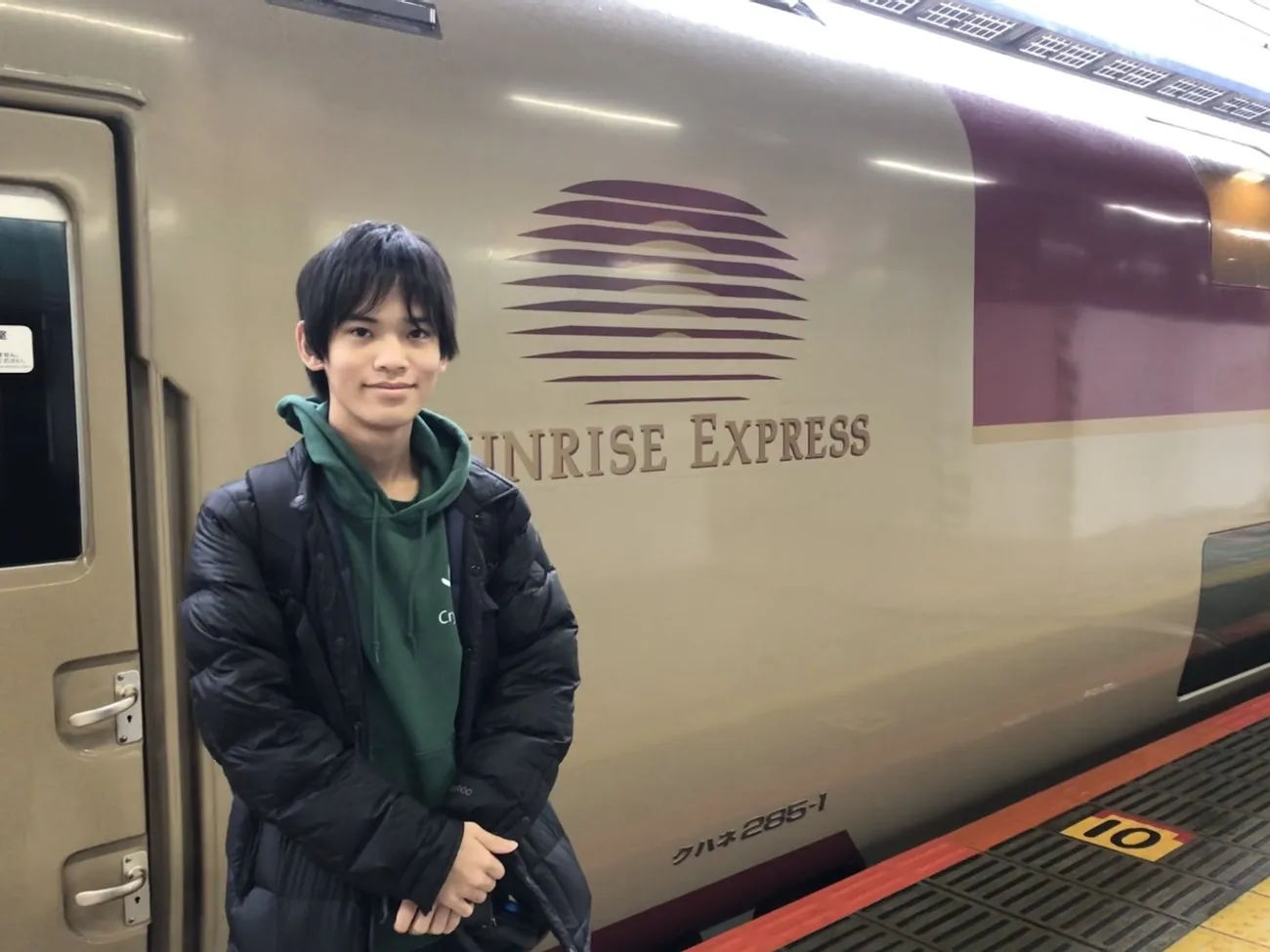 ダウンジャケットを着る筆者