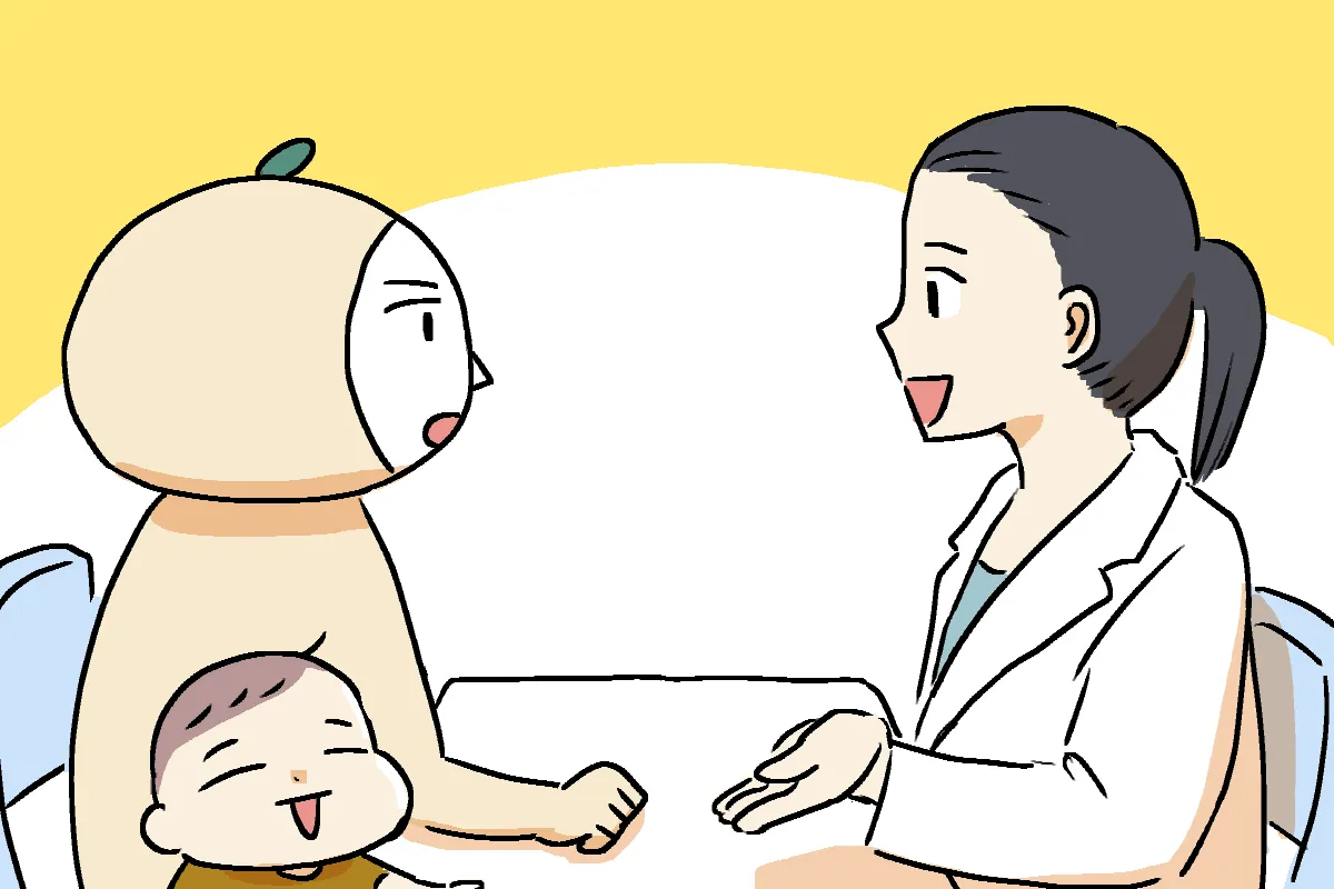 発達外来の先生からアドバイスをもらう私。息子も笑って同席している。